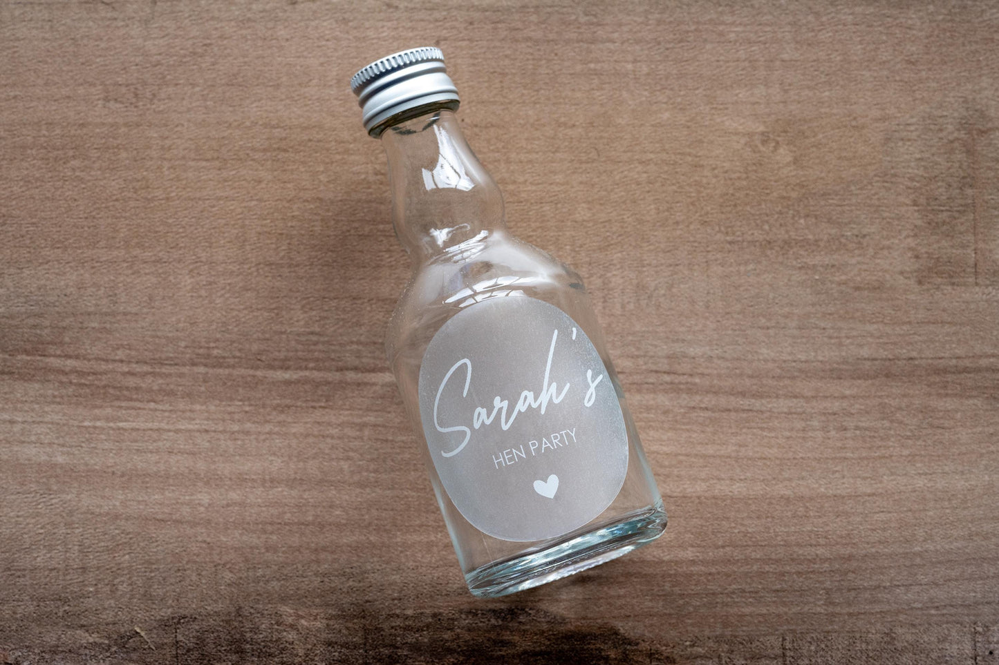This is a perfect example of how these personalised hen party stickers can be used by applying them on mini bottles for shots. They can be used for all sorts of favours for the personalised touch.