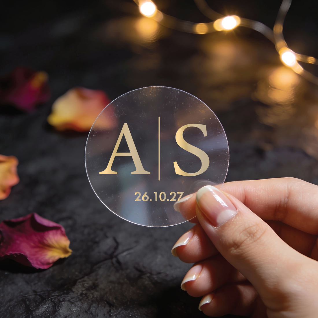 Transparent round stickers with rose gold foil printed monogram initials in the centre and date at the bottom