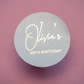 The name of the birthday celebrant in the middle of the sticker, using lovely metallic gold foil with a beautiful handwriting font. The birthday persons age can be personalised for any birthday celebration.