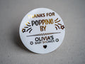 Create memorable baby shower favours with our custom "Thank You for Popping By" stickers, featuring gold-embossed text and shooting stars. Personalised with the mum-to-be’s name, surrounded by flowers and a heart.
