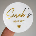 This hen party sticker features the bride-to-be's name in an elegant handwriting font, embossed with luxurious metallic foil. Perfect for adding a personalised touch to hen party favours, invitations or decorations. Ideal for custom hen party themes.