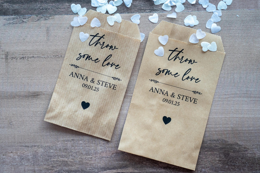Custom confetti envelopes with the name of the bride and groom. &quot;Throw Some Love&quot; written in a lovely handwritten font and the date of the wedding at the bottom with a heart icon to finish off. Add metallic foil for a lovely finish.