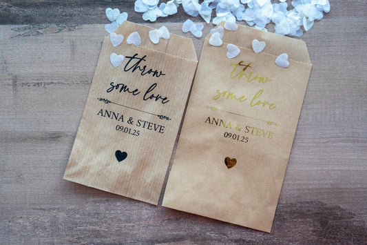 Custom confetti envelopes with the name of the bride and groom. &quot;Throw Some Love&quot; written in a lovely handwritten font and the date of the wedding at the bottom with a heart icon to finish off. Add metallic foil for a lovely finish.