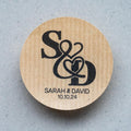 Round kraft stickers with 'S & D' design
