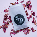 A black monogram sticker printed using white ink, the initials of the happy couple sit in the middle. The names and wedding date finish the sticker off at the bottom.