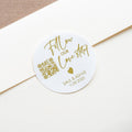 White gloss Sticker with gold text and QR code on a white envelope.
